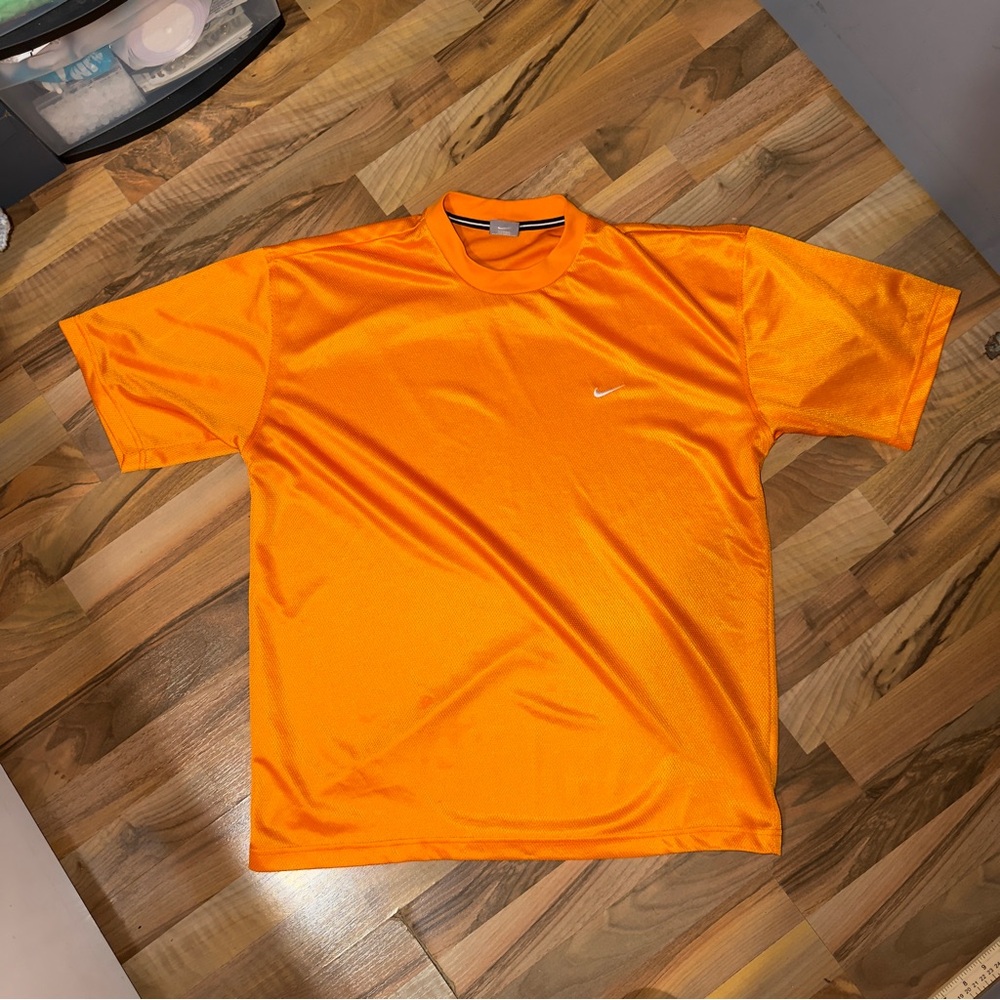 Vintage 90s Nike orange jersey t-shirt with embroidered swoosh
